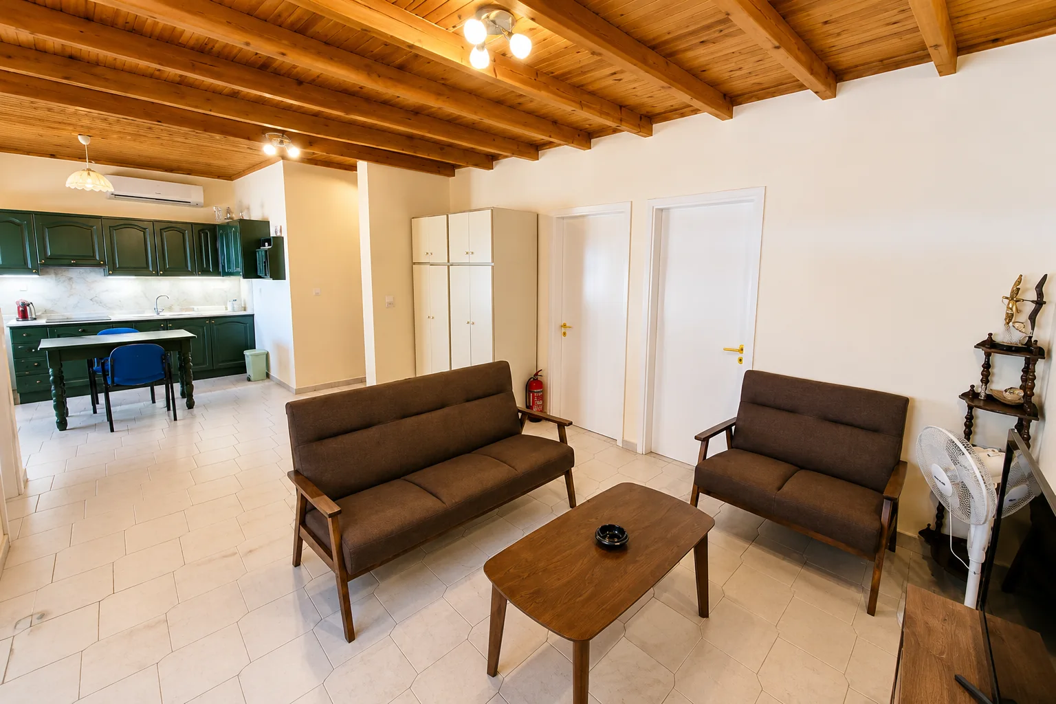Open-plan living room and kitchen at La Terrazza, Villa Vanda